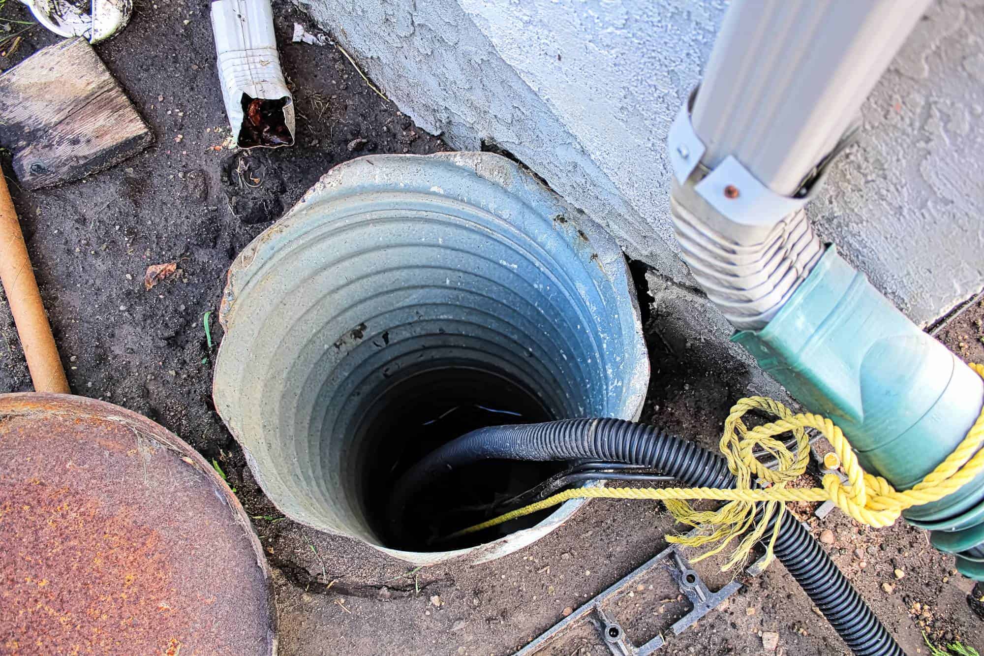 A functional sump pump in a Chicago basement, preventing indoor flooding and water damage during heavy Illinois rain